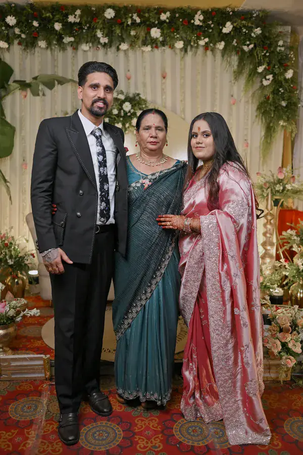 Manisha and Sumit with an elder of the family
